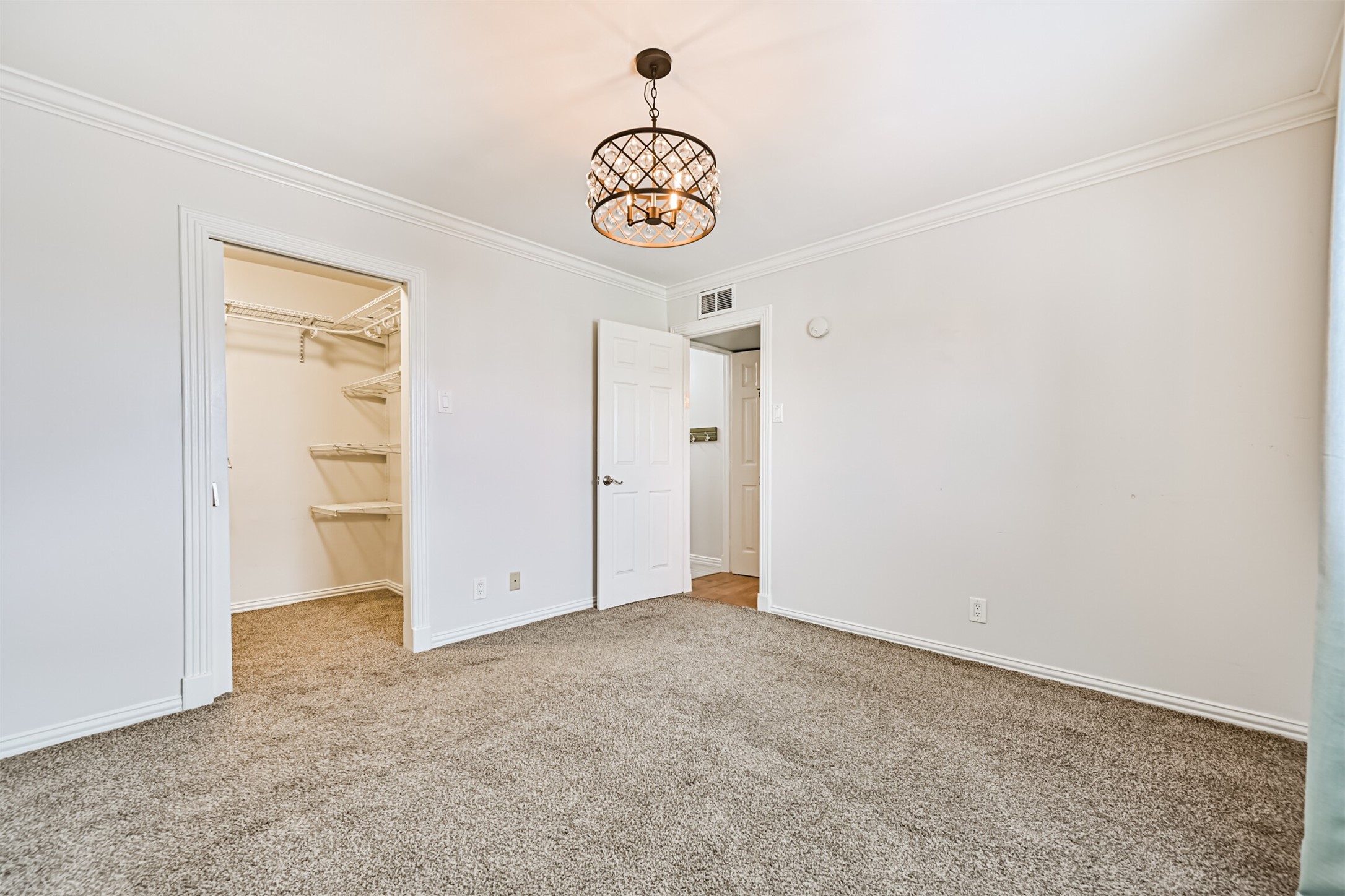 402 Postoffice Street, Unit 201 Galveston, TX 77550 - Photo 20 of 29 a view of an empty room with a window