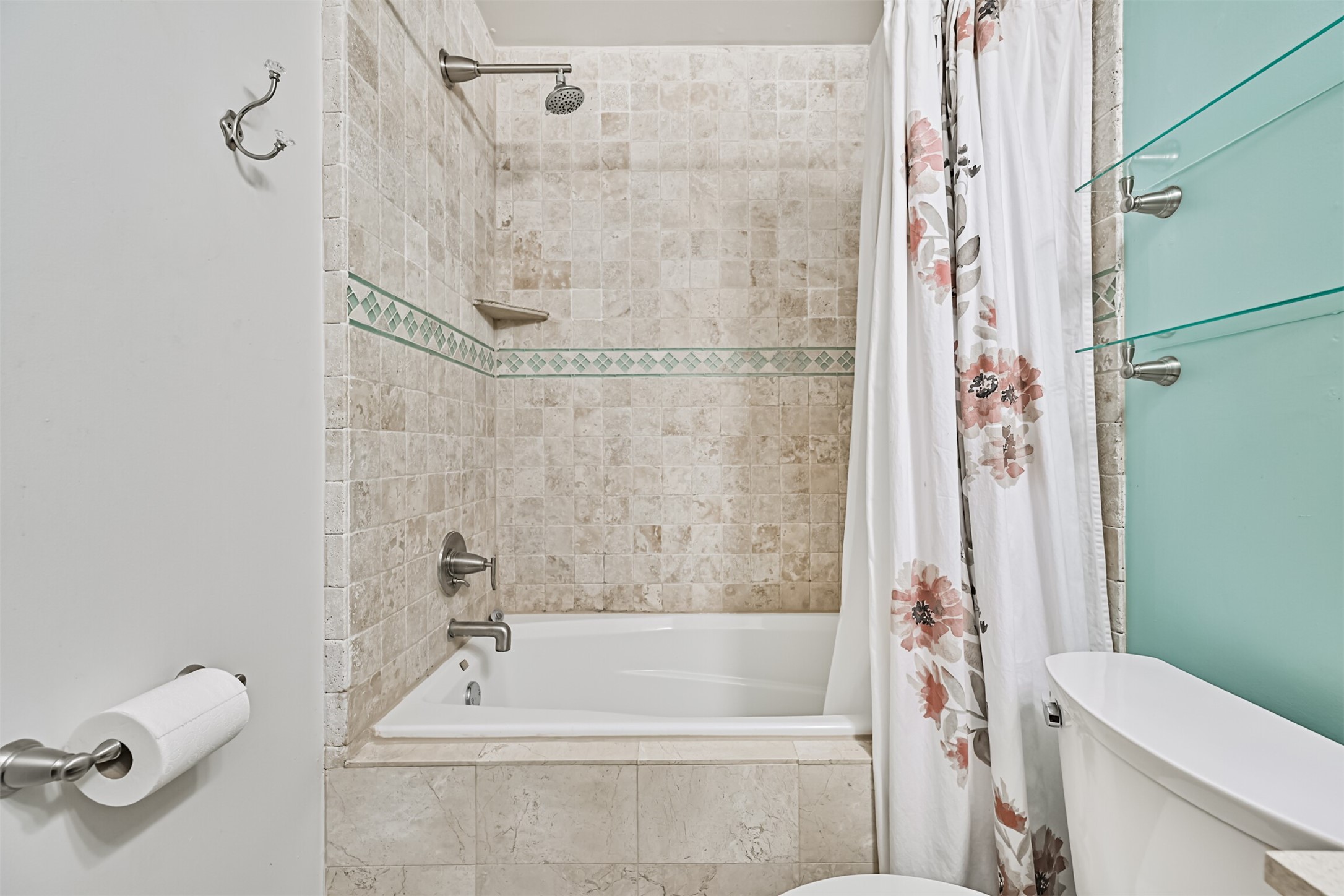 402 Postoffice Street, Unit 201 Galveston, TX 77550 - Photo 23 of 29 a bathroom with a bathtub and a shower