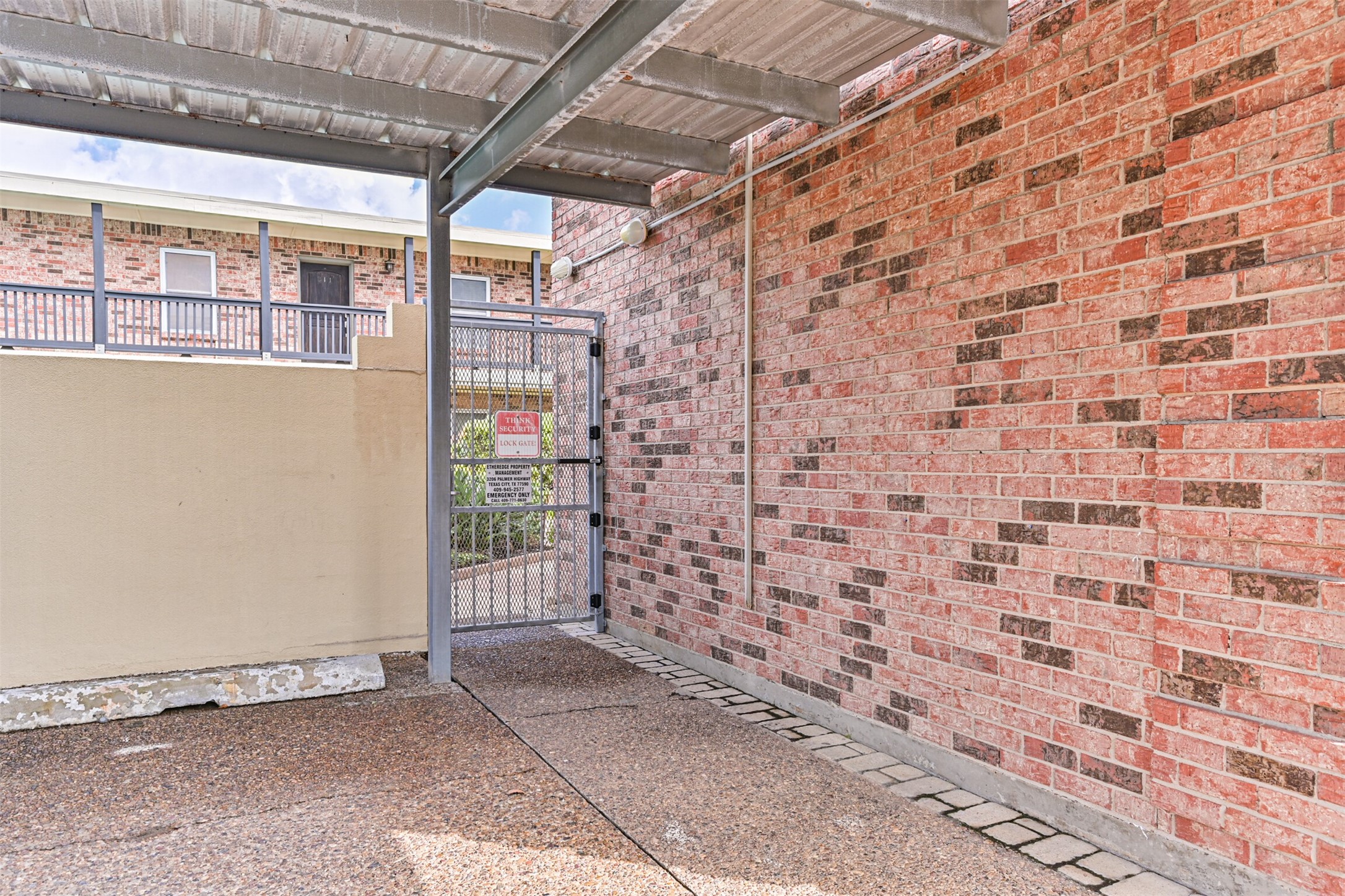 402 Postoffice Street, Unit 201 Galveston, TX 77550 - Photo 28 of 29 a view of a wooden door
