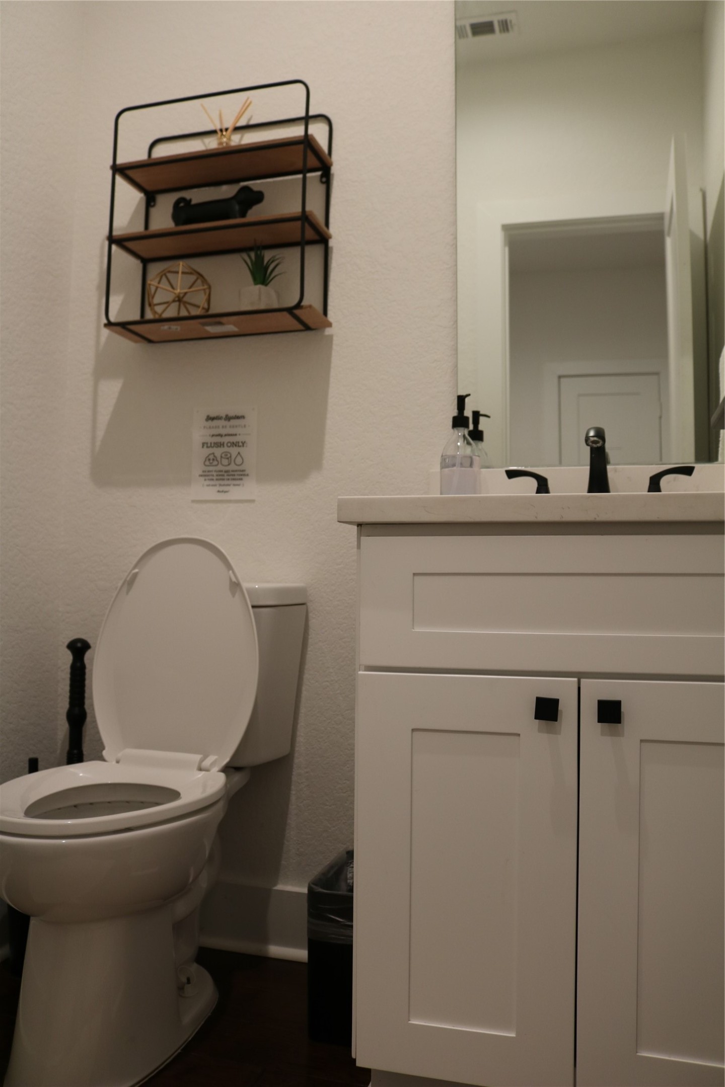 4714 Fisk Street Houston, TX 77009 - Photo 10 of 20 a bathroom with a sink and a mirror