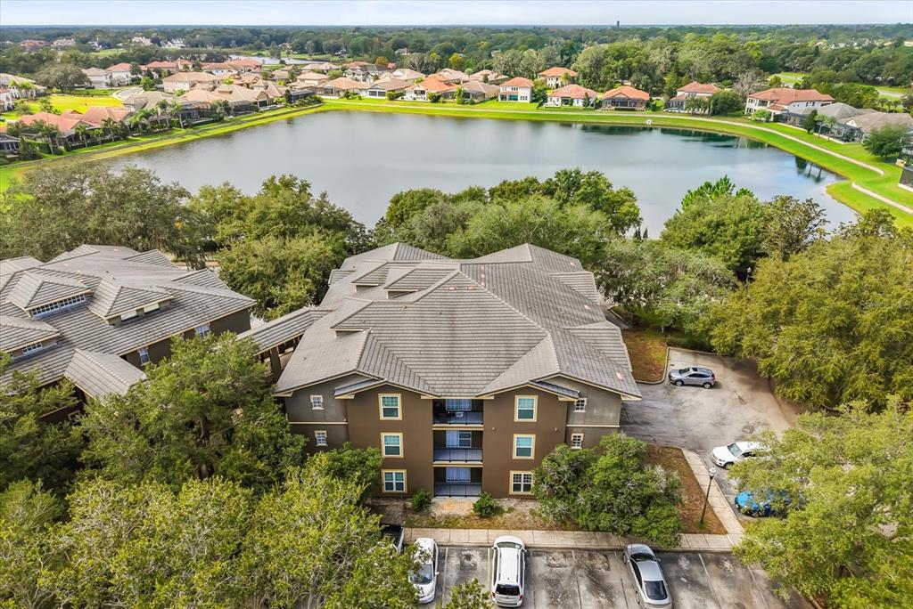 126 Vista Verdi Circle, Unit 108 Lake Mary, FL 32746 - Photo 20 of 20 an aerial view of a house with a lake view