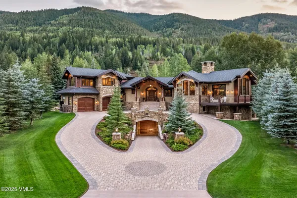 an aerial view of a house with garden