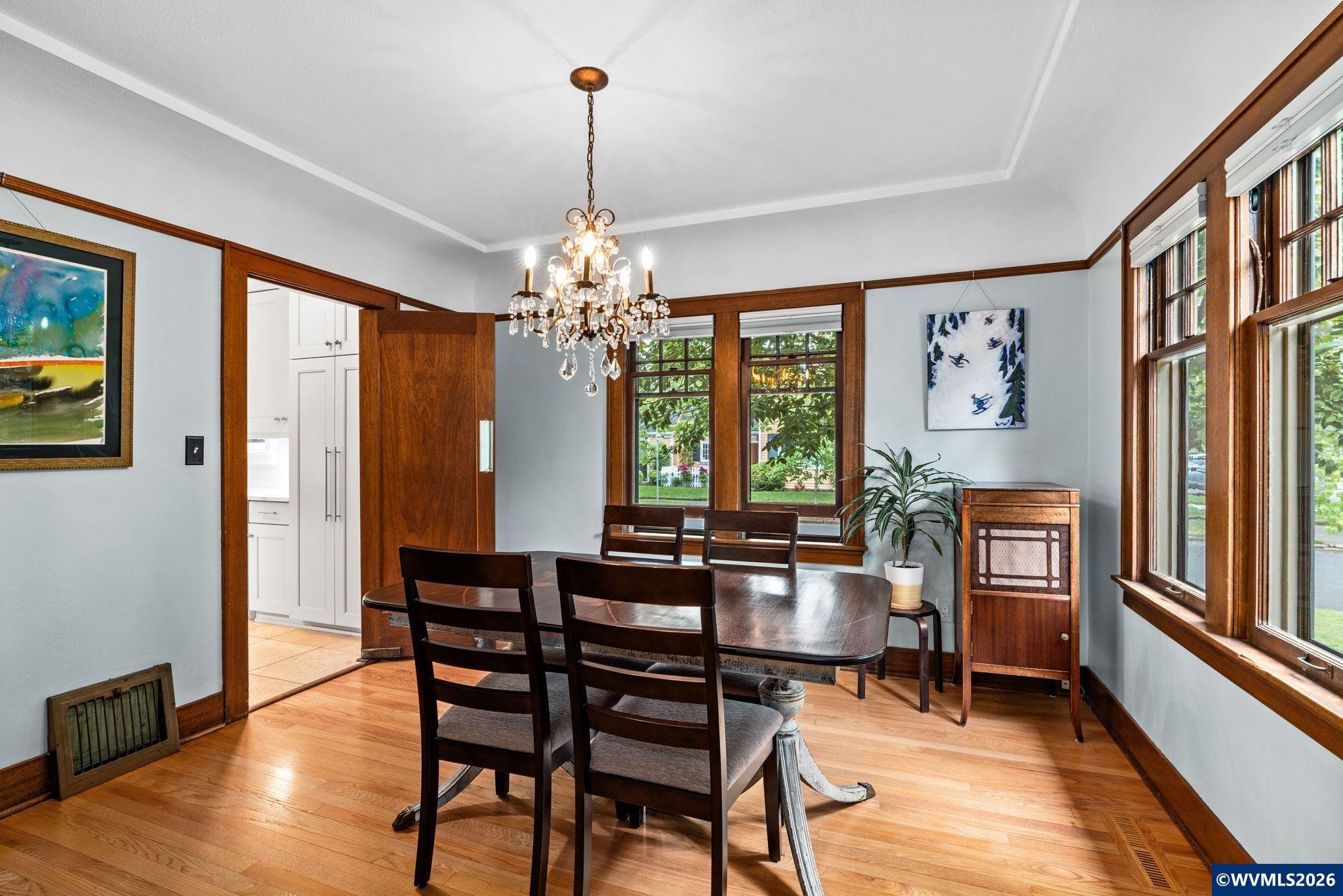 444 Northwest 35th Street Corvallis, OR 97330 - Photo 12 of 40 a view of a dining room with furniture window and wooden floor