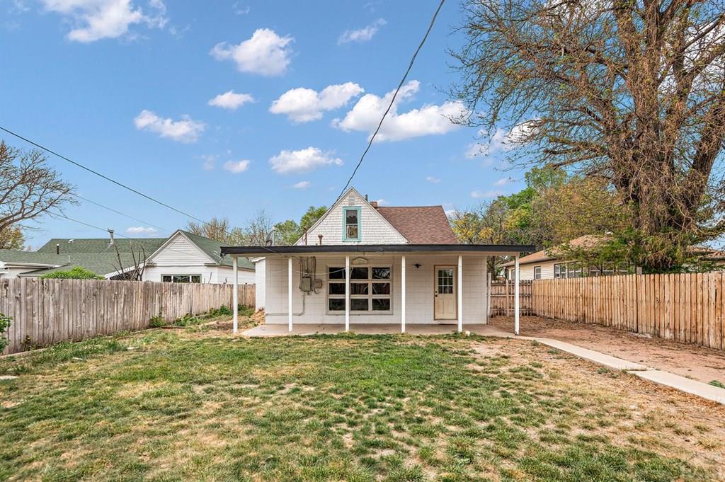 405 7th Street Fowler, CO 81039 - Photo 21 of 25 a front view of a house with a yard