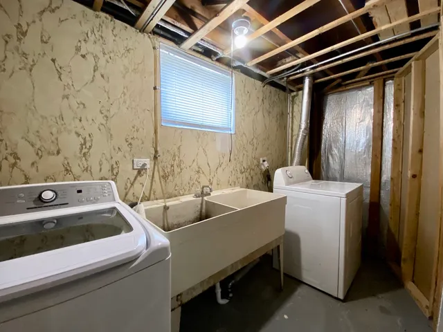 a backyard of a house with garage