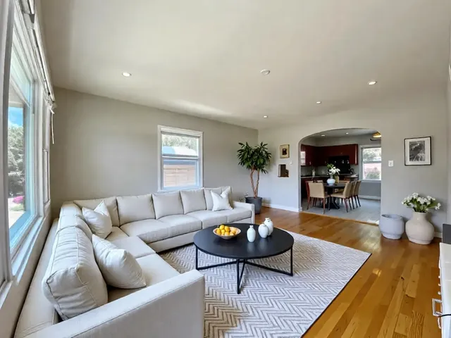 a living room with furniture and a couch