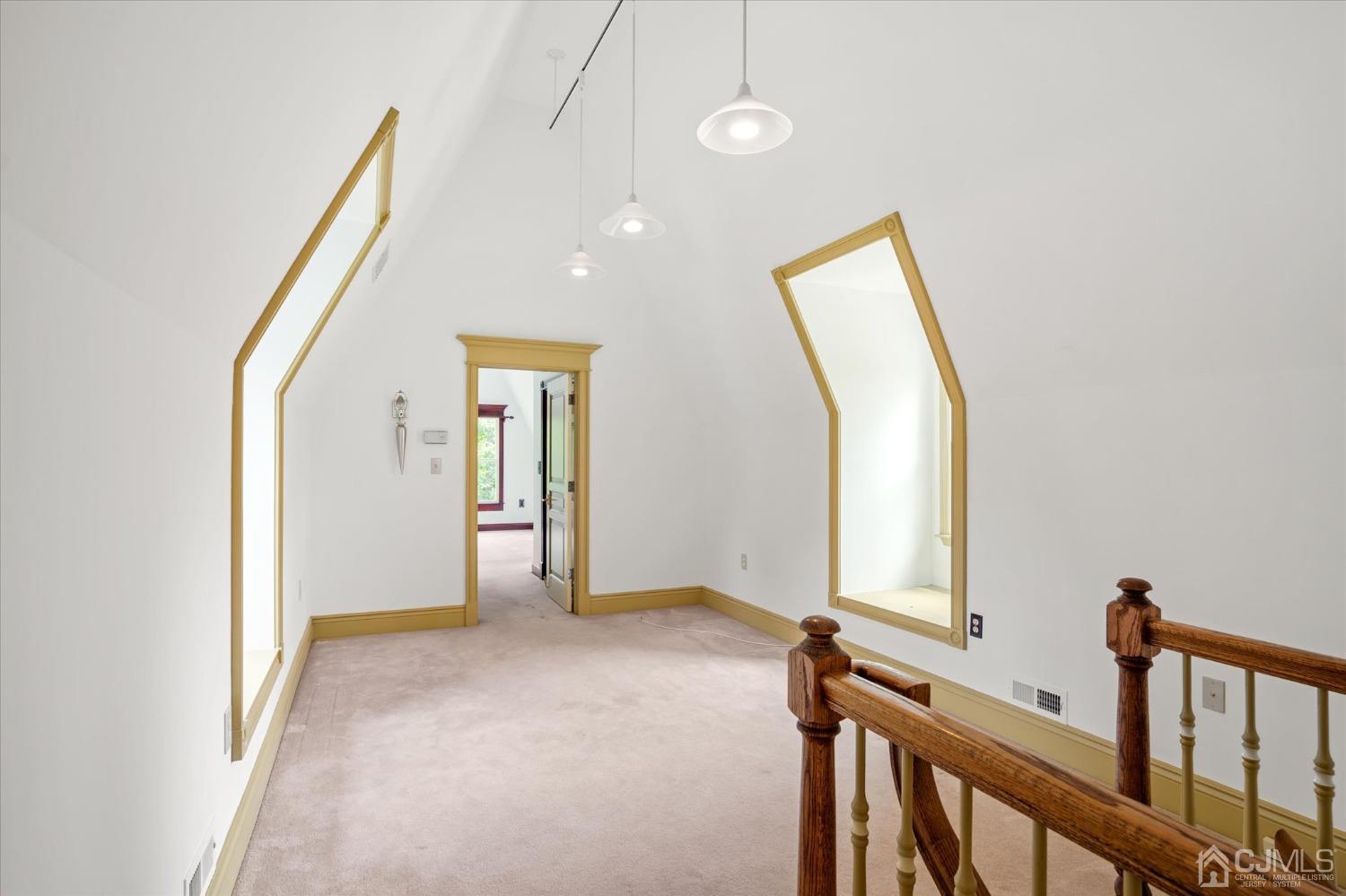 2 Old Mill Road Pennington, NJ 08534 - Photo 28 of 45 a view of a hallway with windows