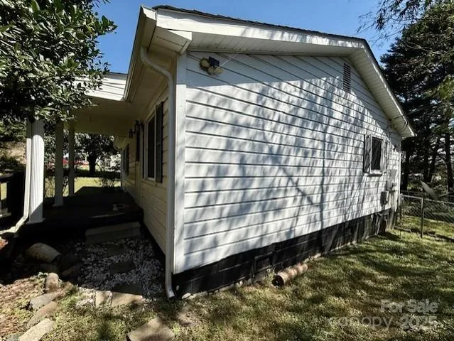a view of balcony with wooden floor and outdoor space