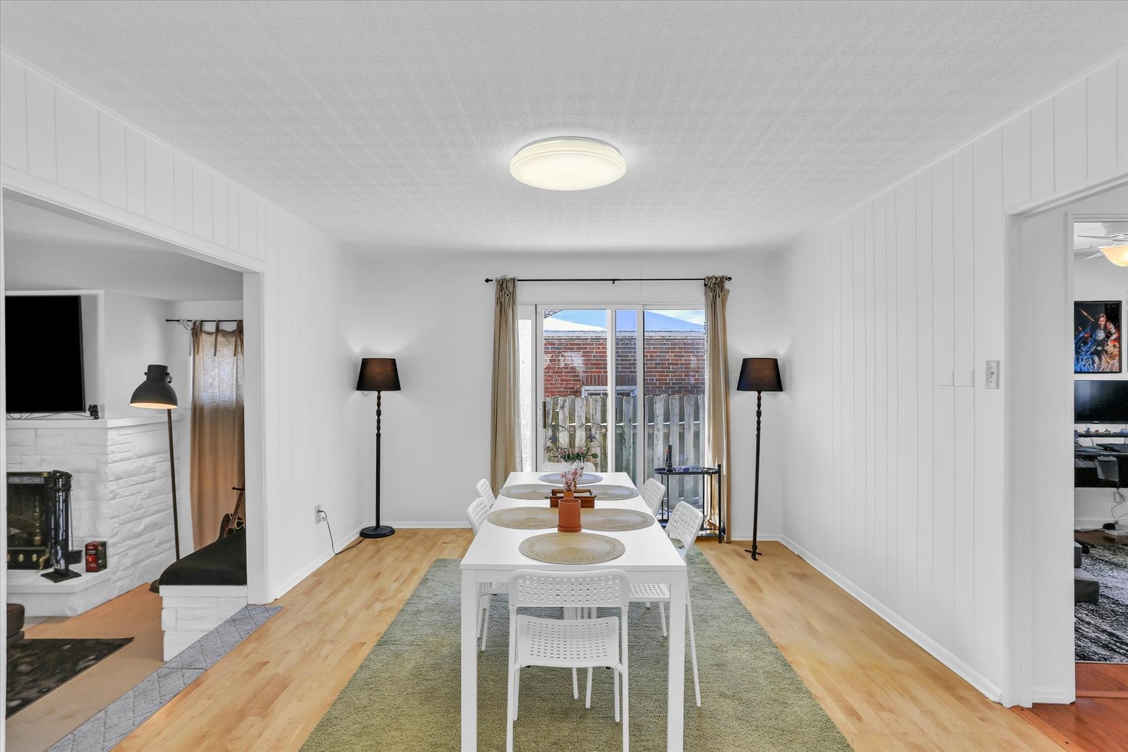 913 West Union Street Champaign, IL 61821 - Photo 11 of 32 a living room with fireplace furniture and a flat screen tv