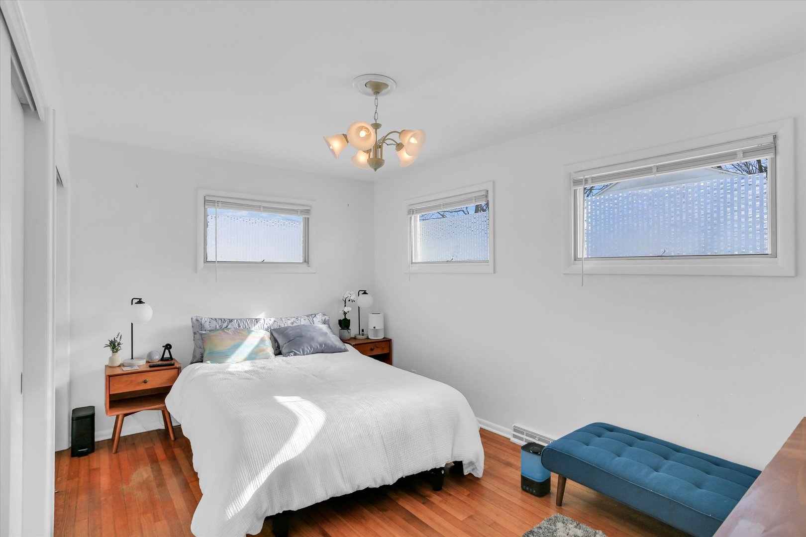 913 West Union Street Champaign, IL 61821 - Photo 21 of 32 a bedroom with a bed and wooden floor