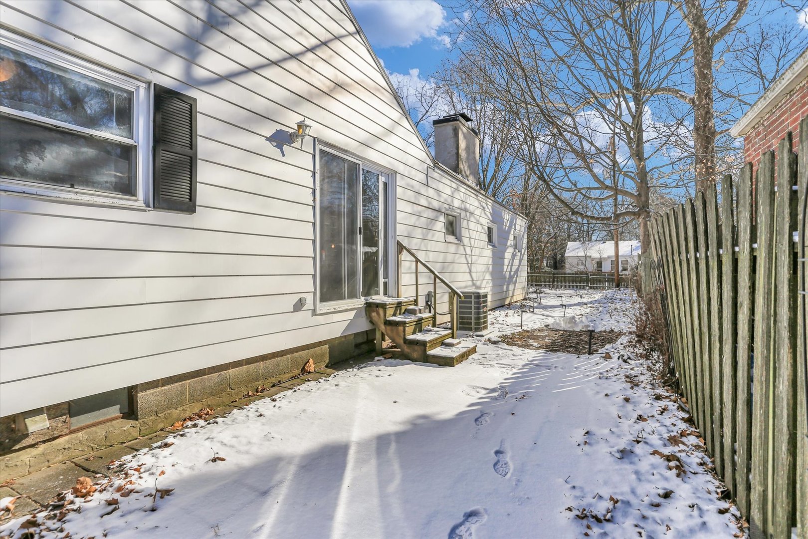 913 West Union Street Champaign, IL 61821 - Photo 28 of 32 a view of a house with a yard