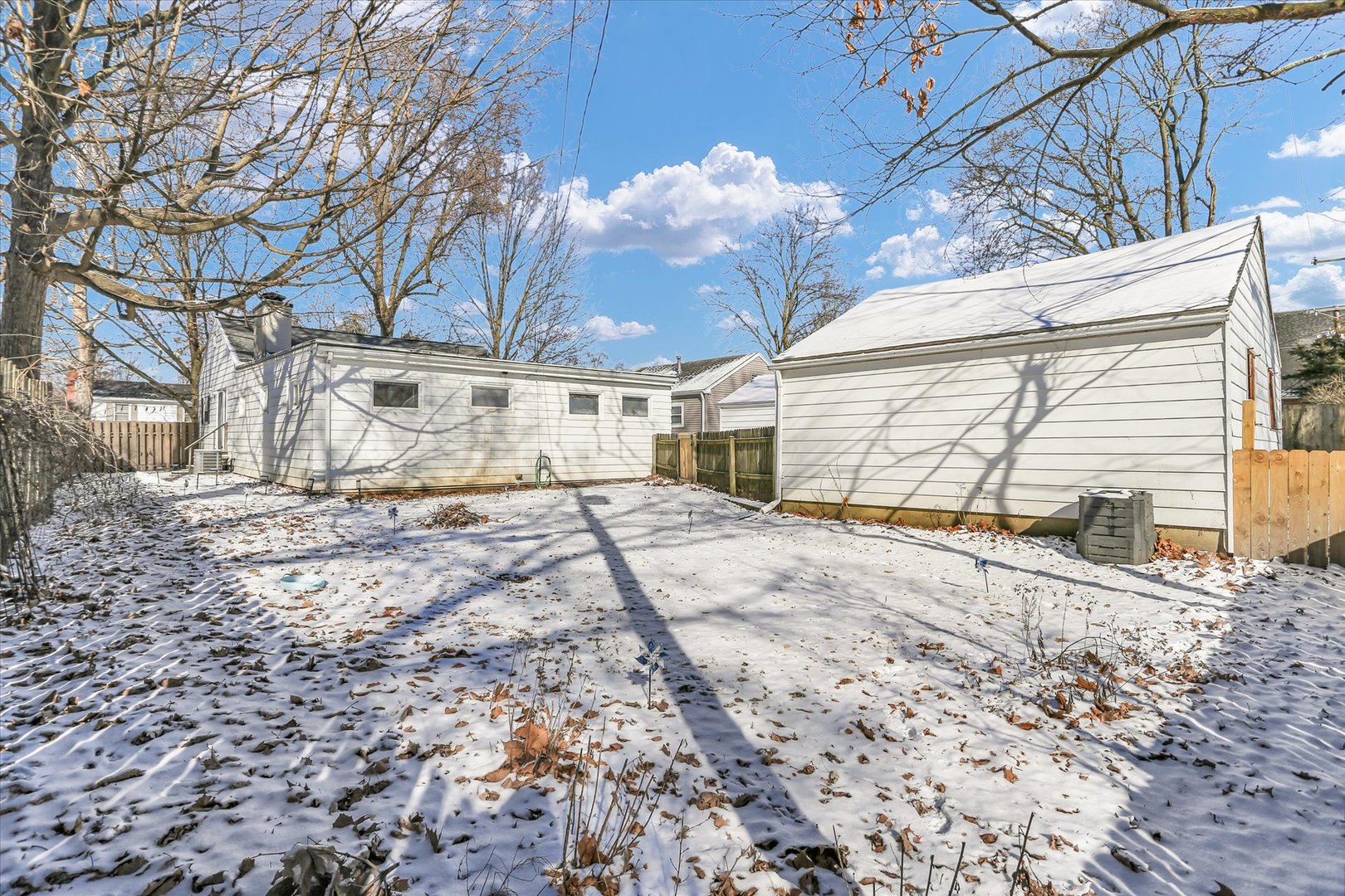 913 West Union Street Champaign, IL 61821 - Photo 29 of 32 a view of a backyard with large trees
