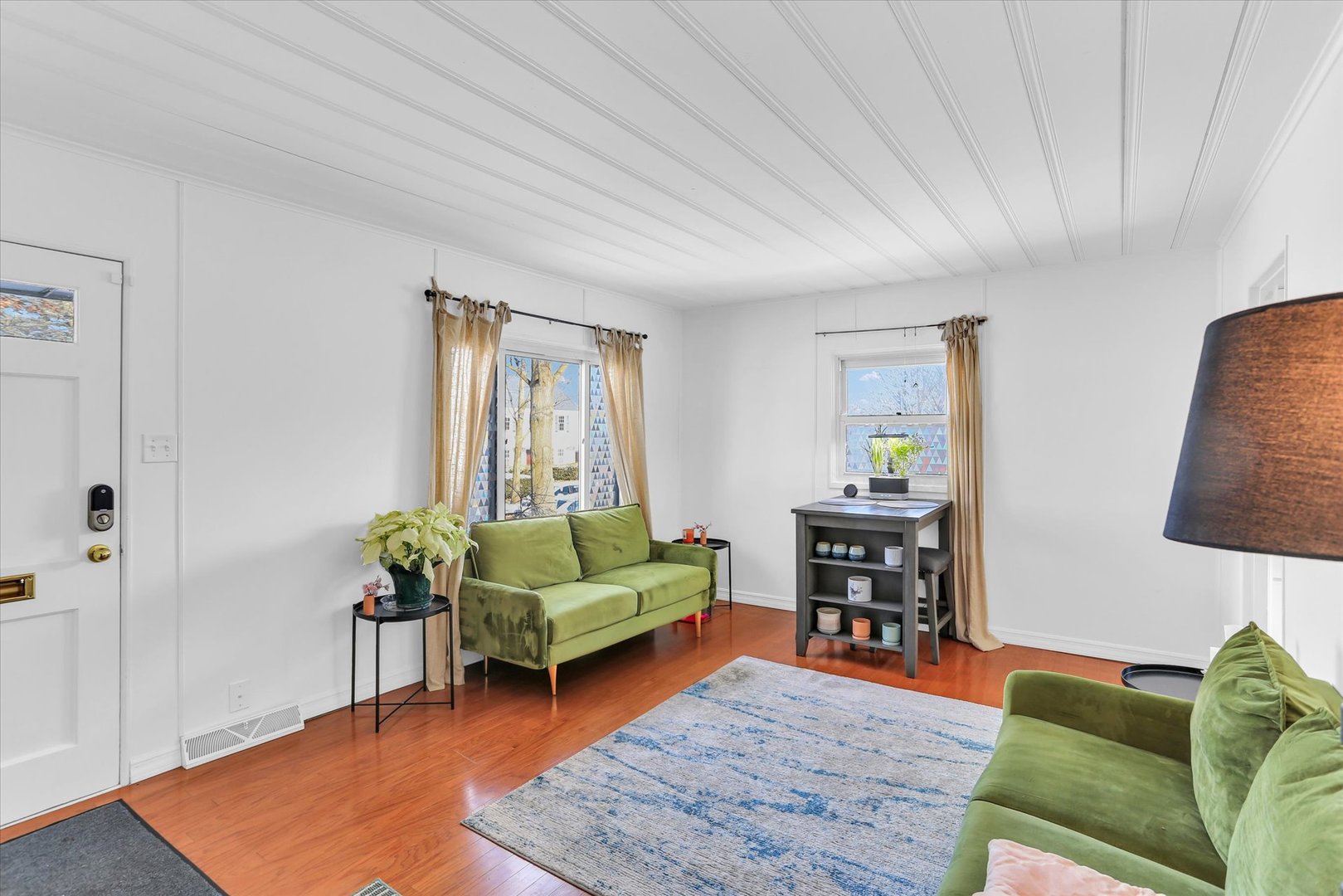913 West Union Street Champaign, IL 61821 - Photo 4 of 32 a living room with furniture and a wooden floor