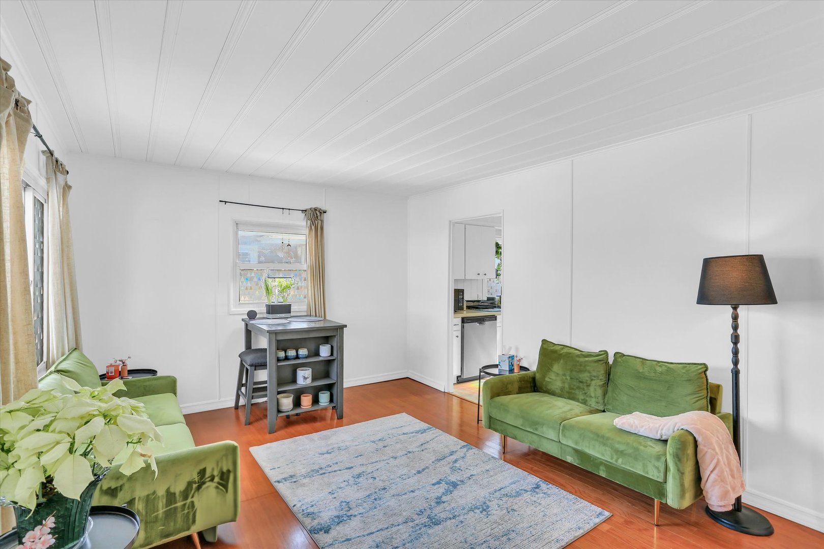 913 West Union Street Champaign, IL 61821 - Photo 6 of 32 a living room with furniture and a lamp