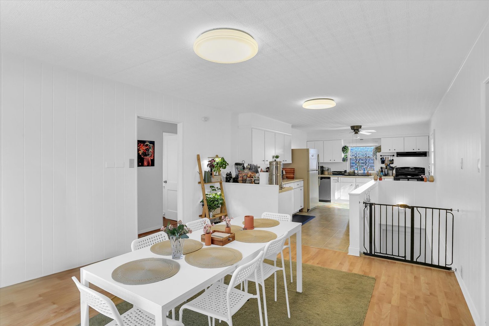 913 West Union Street Champaign, IL 61821 - Photo 10 of 32 a view of a dining room with furniture and wooden floor