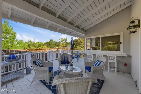 a view of a patio with furniture