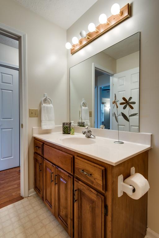 931 Hargrove Road West Dickson, TN 37055 - Photo 13 of 23 a bathroom with a sink vanity and a mirror