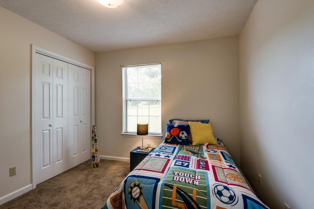 931 Hargrove Road West Dickson, TN 37055 - Photo 14 of 23 a room with toys and wooden floor