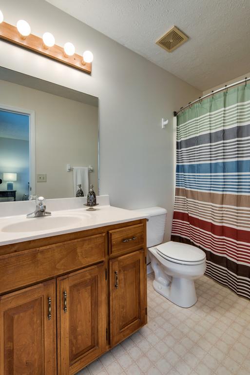 931 Hargrove Road West Dickson, TN 37055 - Photo 20 of 23 a bathroom with a sink toilet and shower