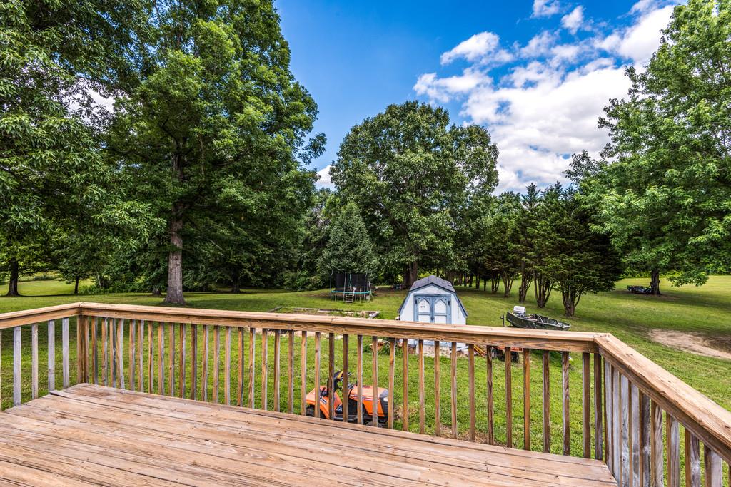 931 Hargrove Road West Dickson, TN 37055 - Photo 22 of 23 a view of deck with patio and yard