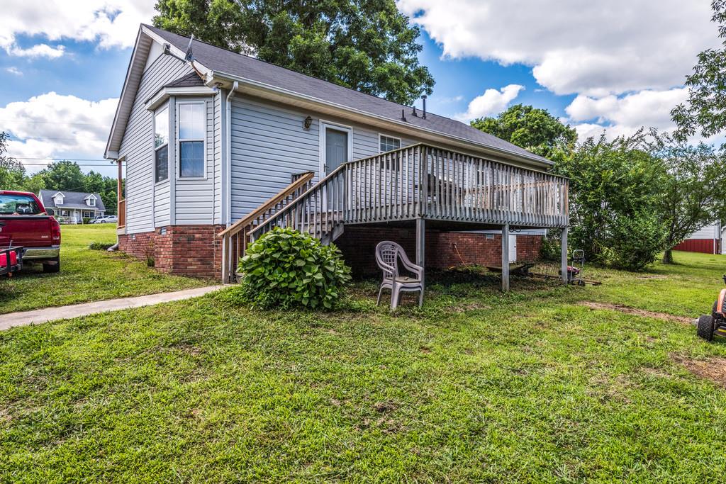 931 Hargrove Road West Dickson, TN 37055 - Photo 23 of 23 a front view of a house with garden