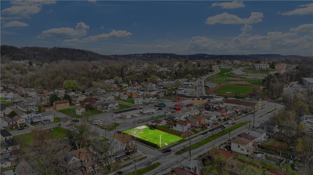 2503 7th Avenue Beaver Falls, PA 15010 - Photo 16 of 22 a view of a yard in front of a house