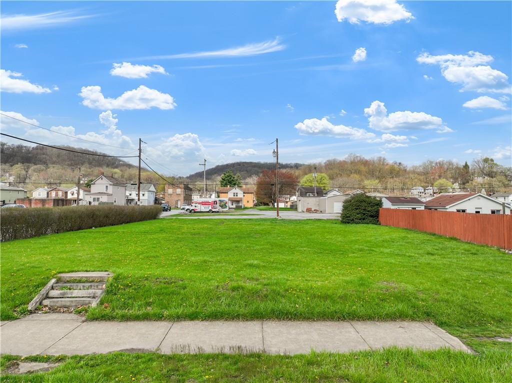 2503 7th Avenue Beaver Falls, PA 15010 - Photo 19 of 22 a view of yard with swimming pool and green space