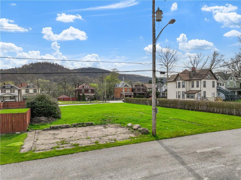 2503 7th Avenue Beaver Falls, PA 15010 - Photo 21 of 22 a view of a fountain in front of a building with a big yard
