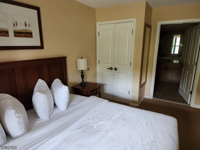 a bathroom with a bathtub and a sink