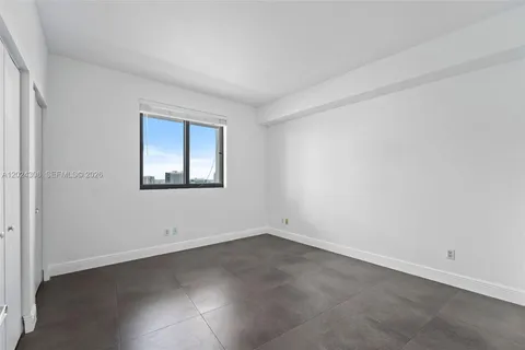 an empty room with a window