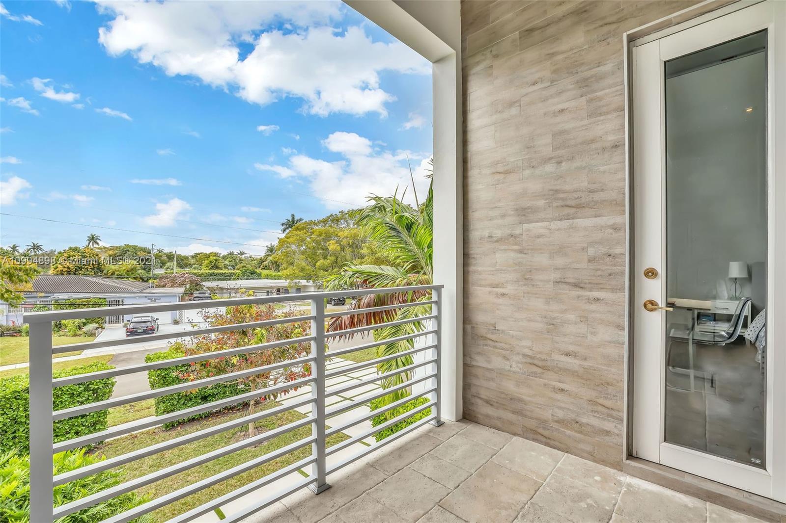 12565 Palm Road North Miami, FL 33181 - Photo 48 of 75 a view of balcony with outdoor space