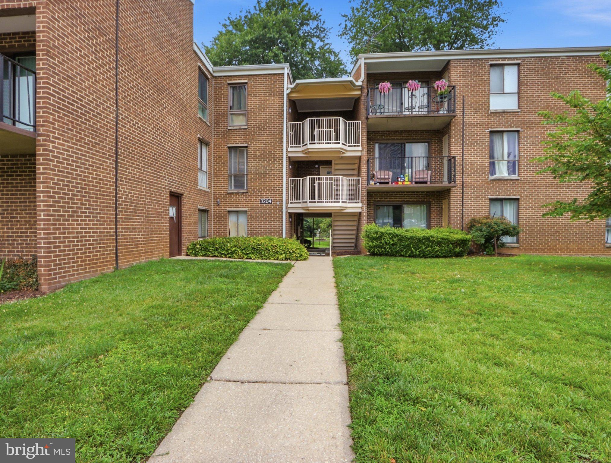 3204 Spartan Road, Unit 10 Olney, MD 20832 - Photo 1 of 31 Charming brick apartment entrance.