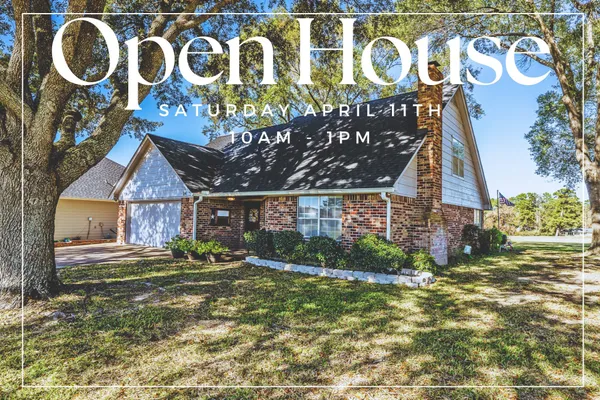 a view of a yard with a table and chairs