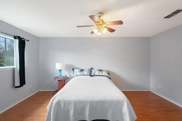 a bathroom with a sink a shower and a mirror