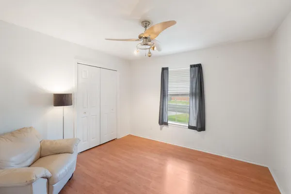 a bathroom with a bathtub a sink and a mirror