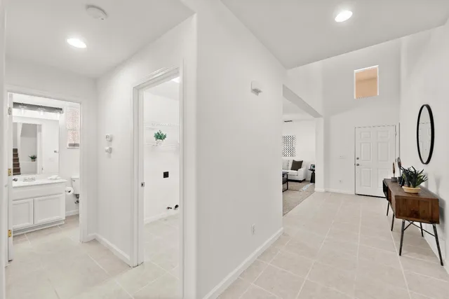 a view of a livingroom with furniture and windows