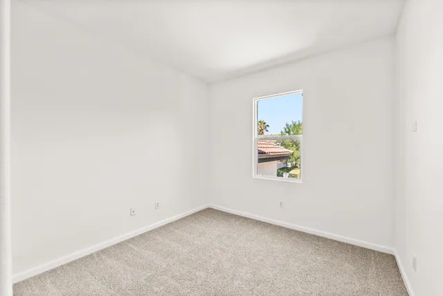 a view of a house with a swimming pool