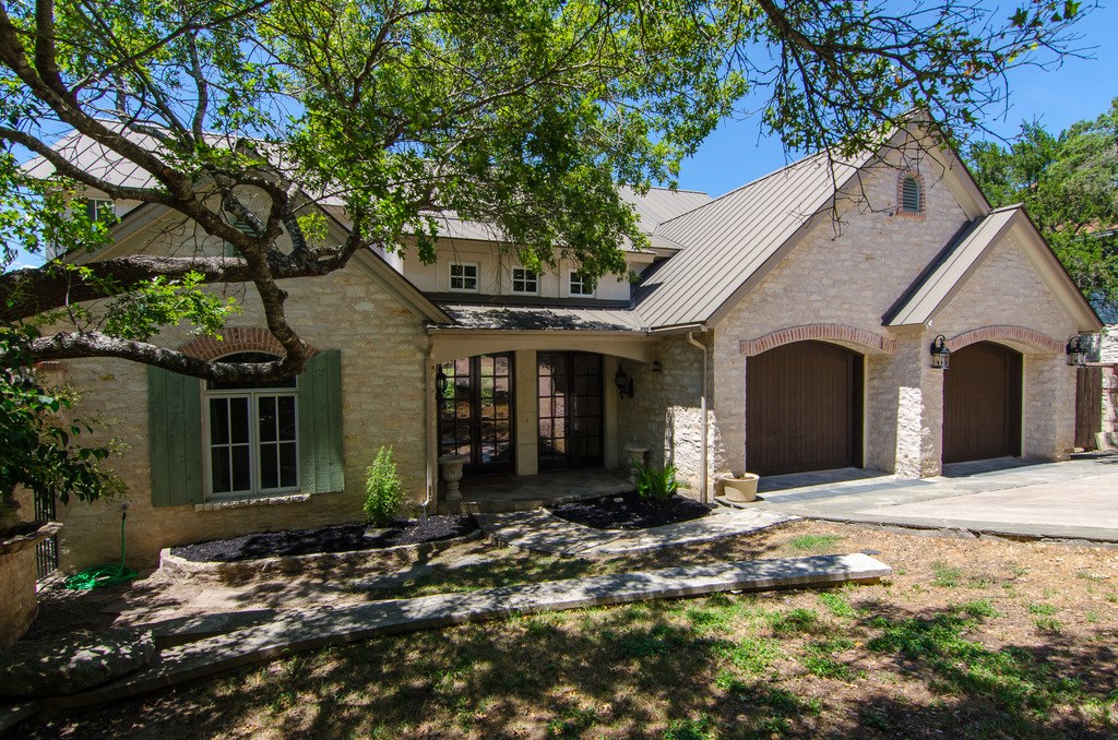 a front view of a house with yard