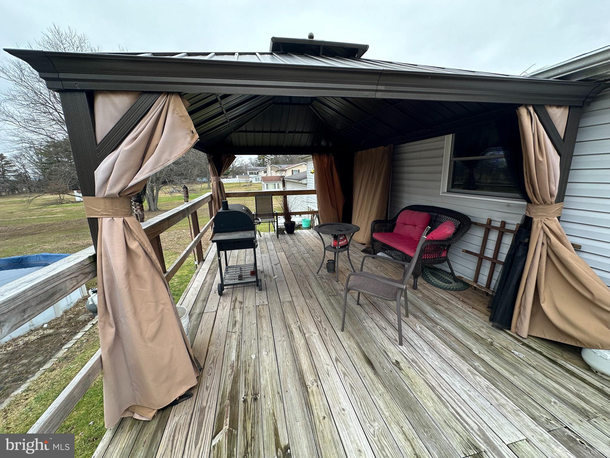 8245 Orchard Road Thomasville, PA 17364 - Photo 17 of 33 Covered deck with sliders