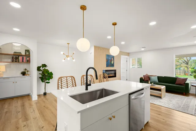 a view of house with a yard