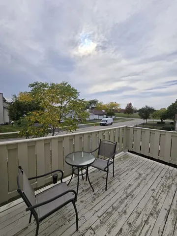 a terrace of a house with outdoor seating