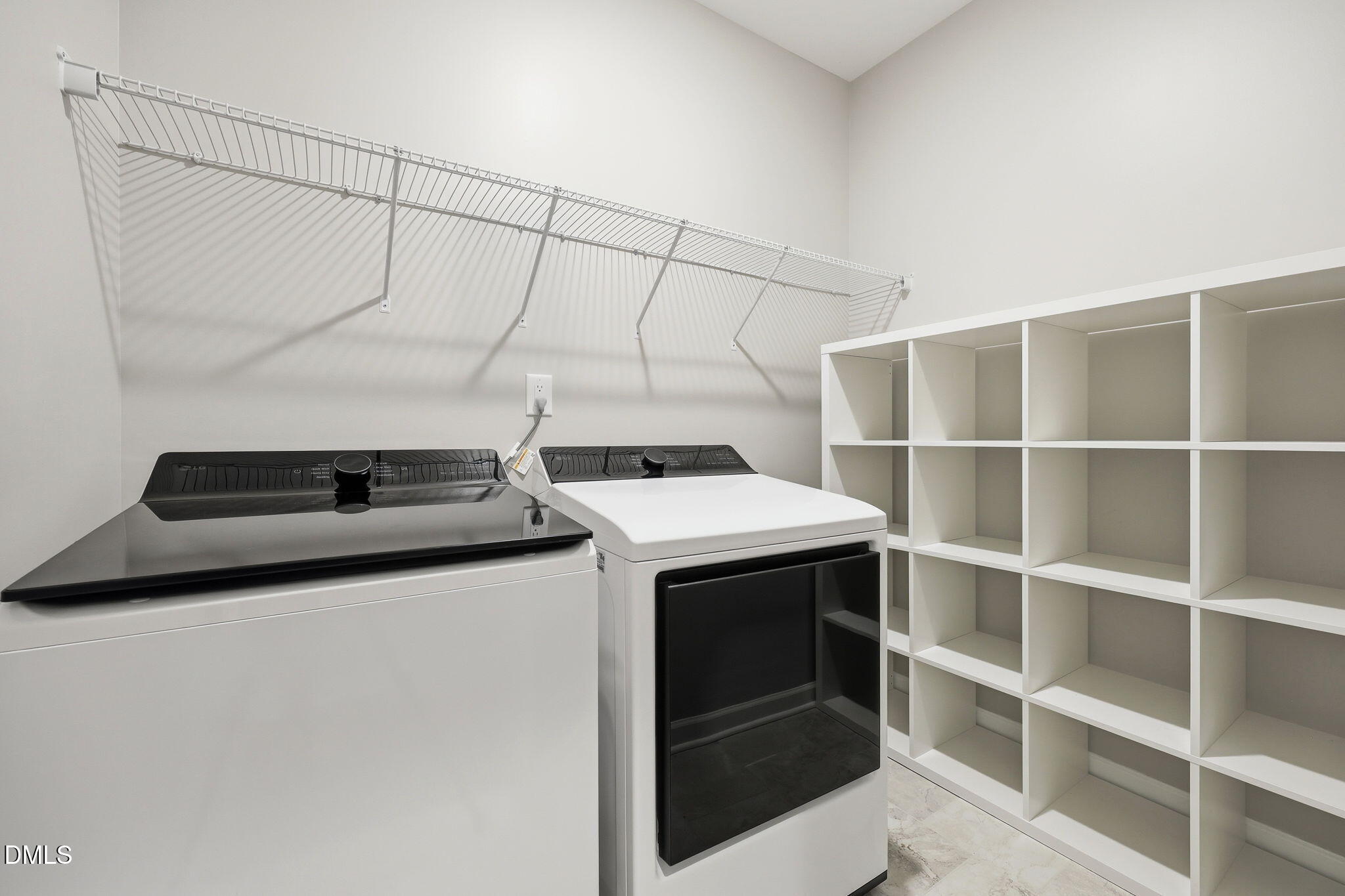 146 Seahawk Way Zebulon, NC 27597 - Photo 33 of 51 a utility room with dryer and washer