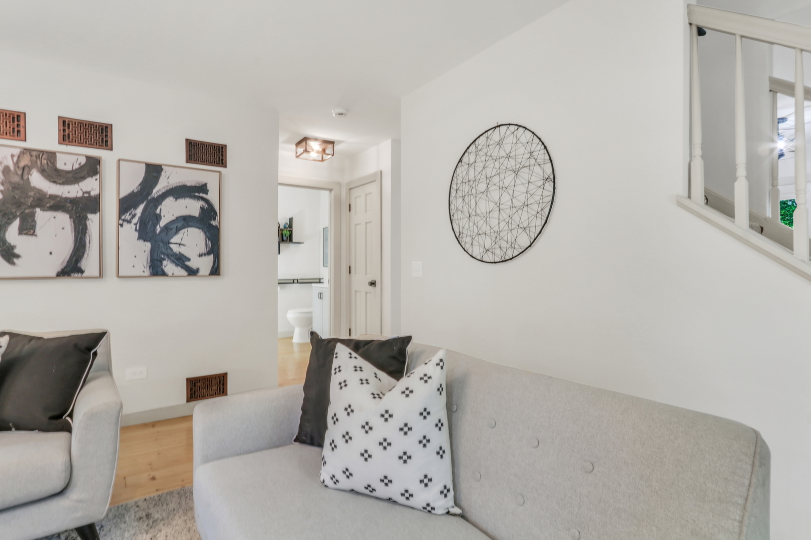 334 Concord Square Gurnee, IL 60031 - Photo 13 of 43 a living room with furniture a rug and wall painting