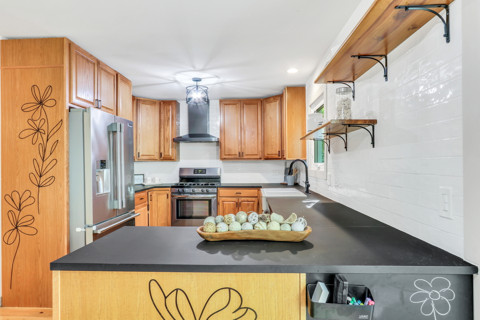 334 Concord Square Gurnee, IL 60031 - Photo 15 of 43 a kitchen with a refrigerator and a stove top oven