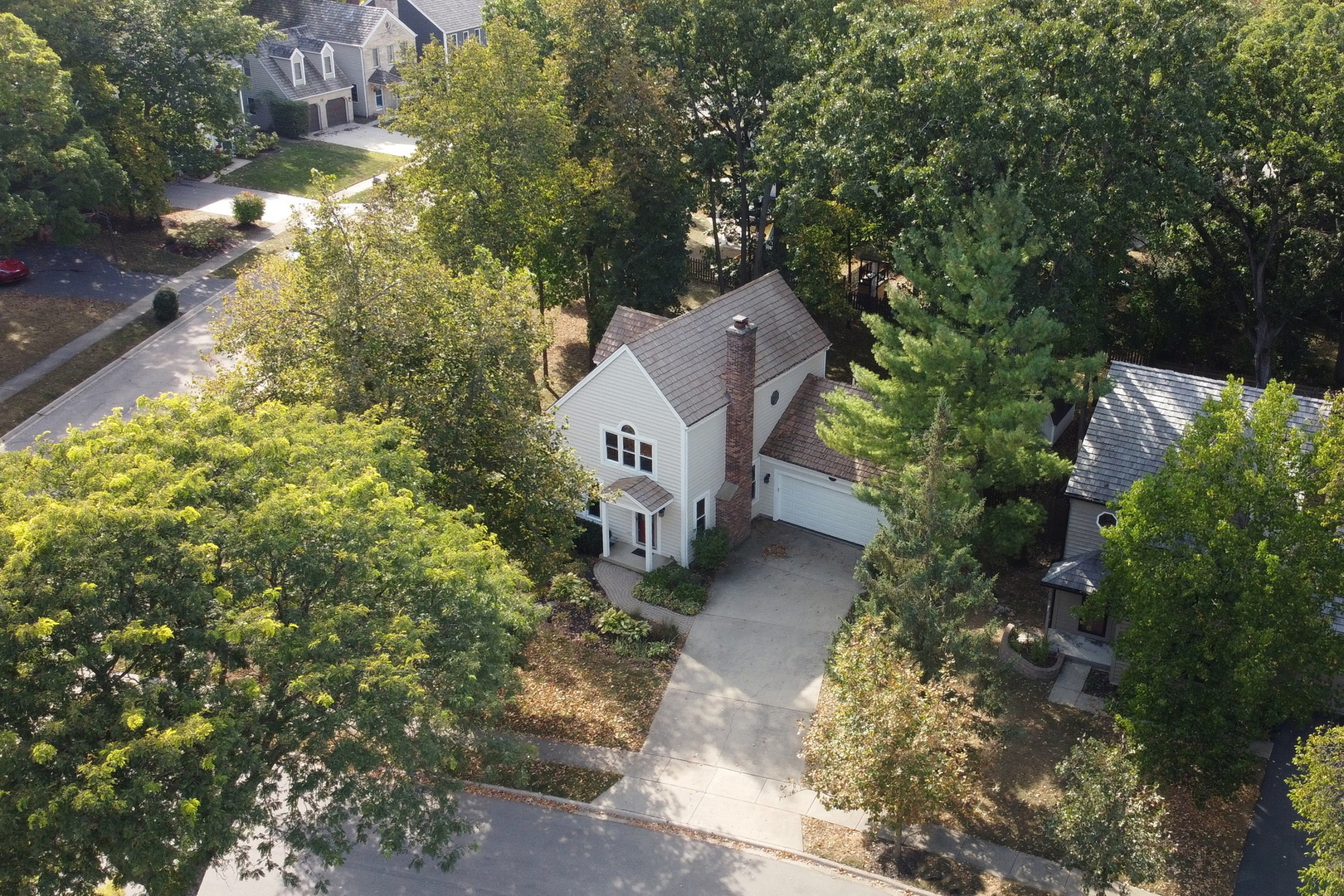 334 Concord Square Gurnee, IL 60031 - Photo 38 of 43 a view of a house with a yard and large trees
