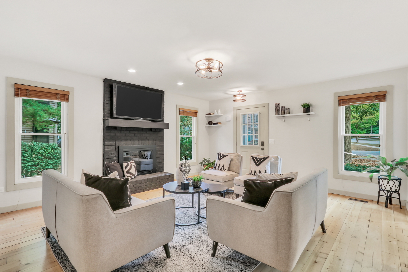 334 Concord Square Gurnee, IL 60031 - Photo 6 of 43 a living room with fireplace furniture and a flat screen tv