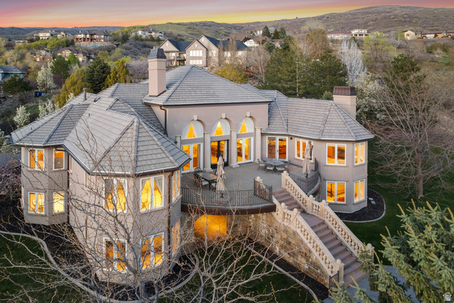 1714 Ridge Point Drive Bountiful, UT 84010 - Photo 123 of 132 Multi-level property with an expansive outdoor patio, grand exterior staircase, and multiple arched windows
