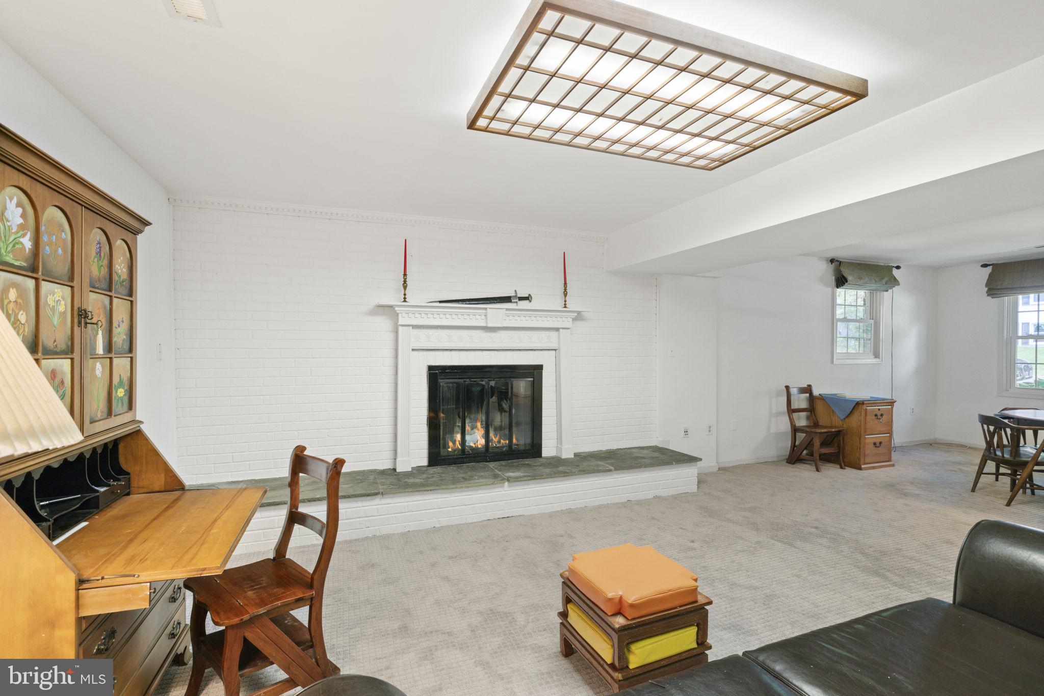 8009 Springfield Village Drive Springfield, VA 22152 - Photo 29 of 47 Family Room in Basement with Cozy Fireplace