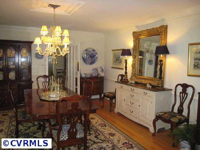 8902 Norwick Road Richmond, VA 23229 - Photo 2 of 10 Other - Kitchen with maple cabinets, stainless appliances and granite counters plus convenient breakfast room
