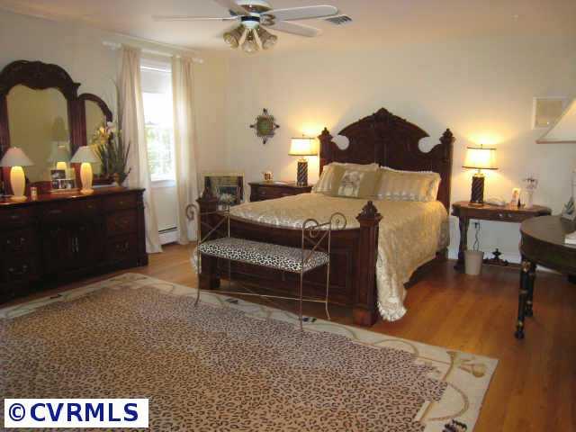 8902 Norwick Road Richmond, VA 23229 - Photo 7 of 10 Other - Lower level media/rec room with fireplace and adjoining kitchenette